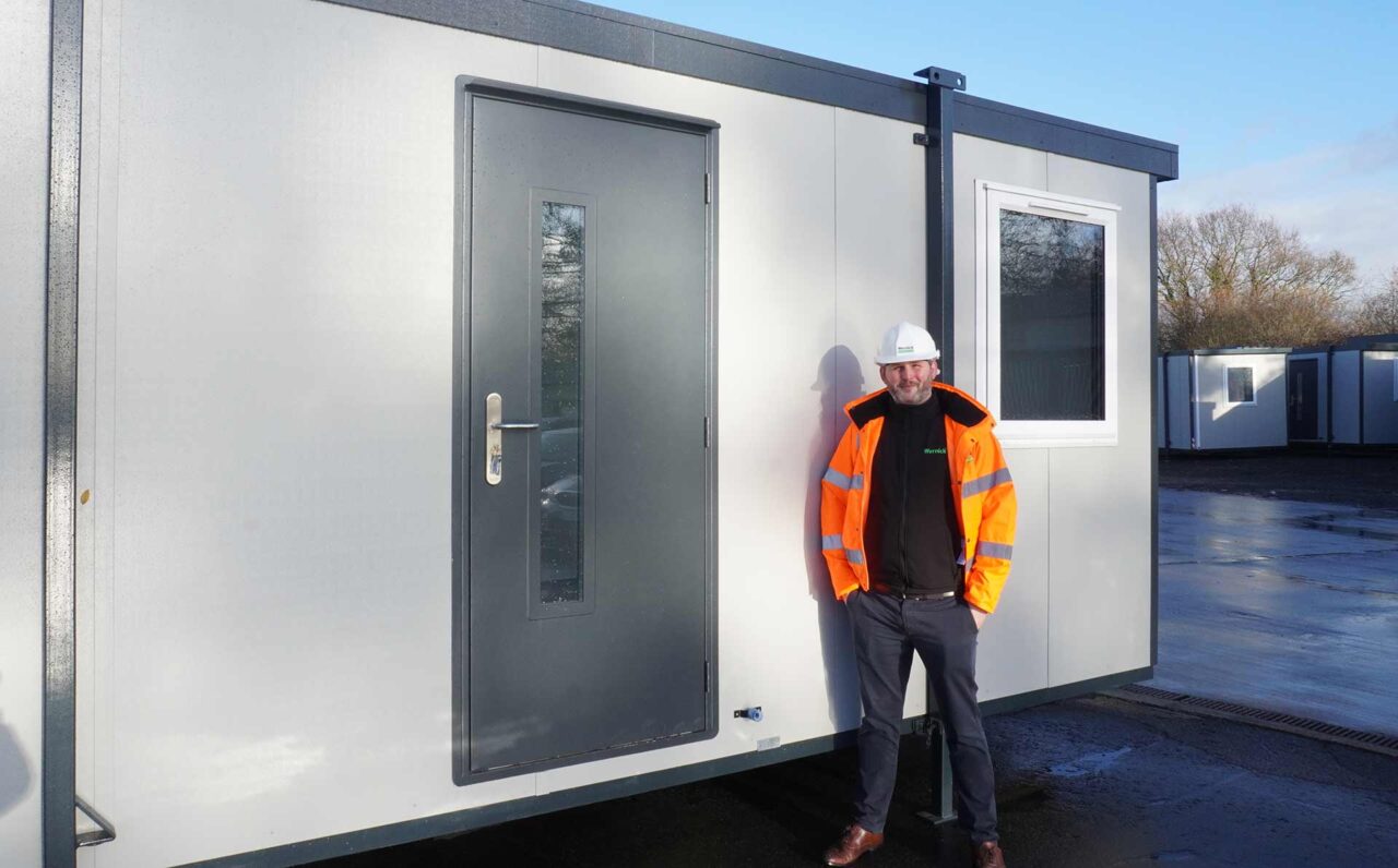 image of Wernick employee outside a cabin